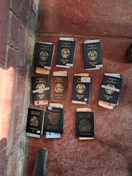 Zimbabwean National Arrested with 582 Passports Stuffed with Cash Intended for Immigration Official