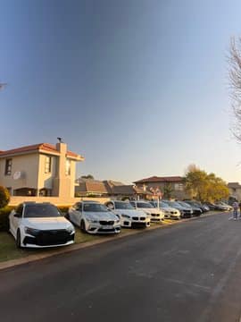 South African Guys Line Up Luxury Cars for Chill Suburban Braai