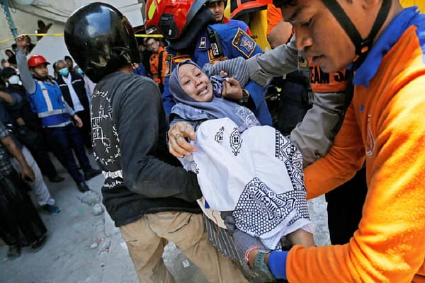 Race Against Time in Indonesia: Earthquake Compresses Rubble, Hampering School Collapse Rescue